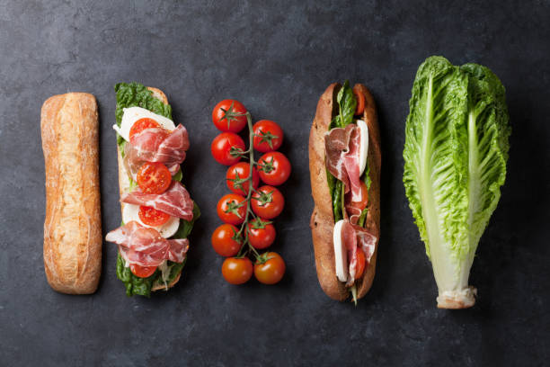 istock Sandwich with salad, prosciutto and mozzarella 642198706