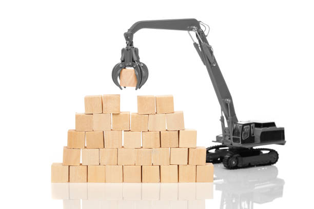 istock Crane and blank wooden cubes 642199304