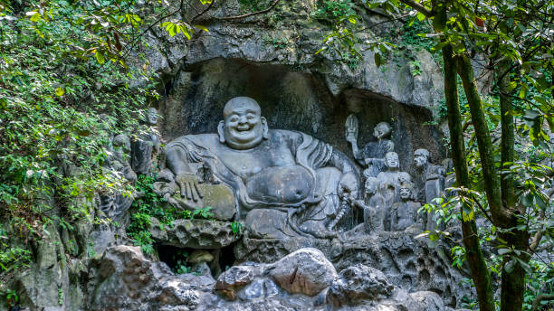 istock Sculpture laughing Buddha - Hotei. 642208268