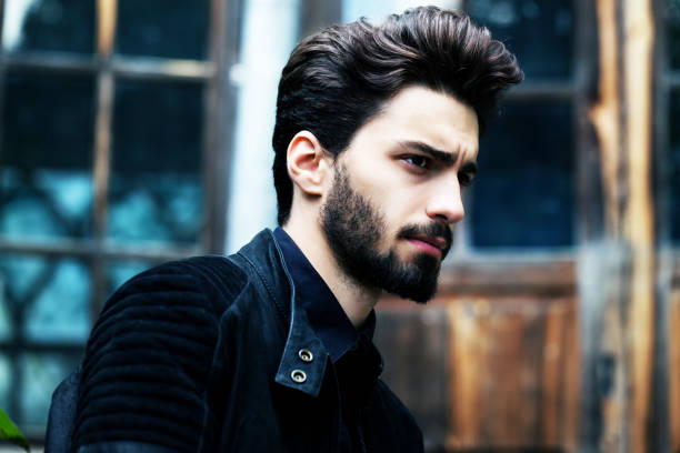 istock Bearded stylish man posing outdoors 642213662