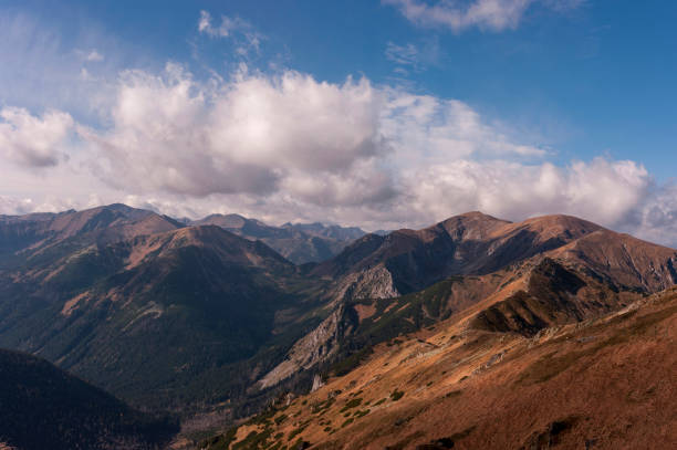istock Panorama of autumnal mountains under the clouds 642217016