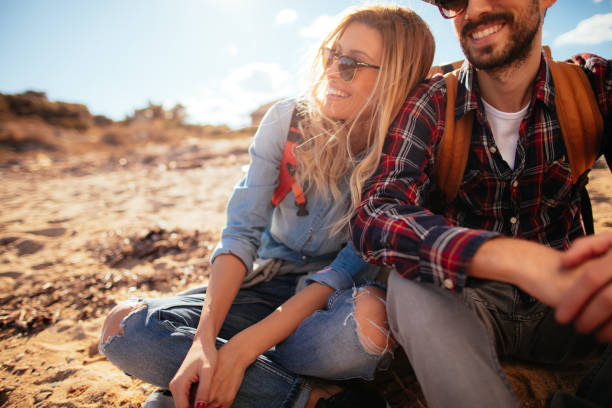 istock Young couple enjoying a day on a beach 642231952