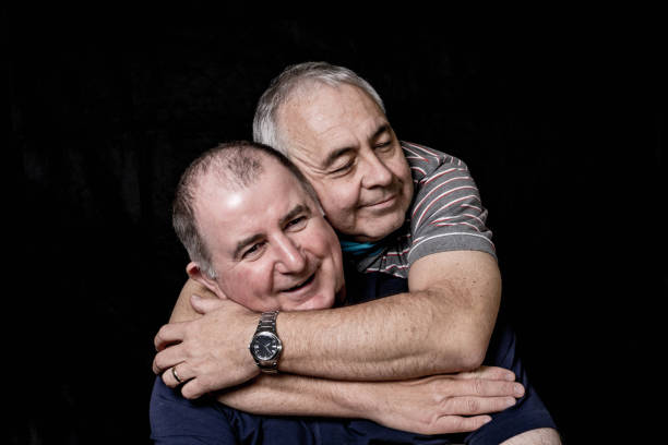 same-sex senior men stock photo