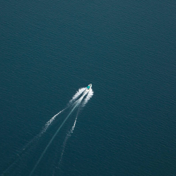 istock Sailing boat on a lake in perfect loneliness 642241736