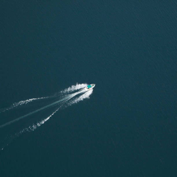 istock Sailing boat on a lake in perfect loneliness 642241756