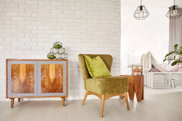 Photo of Wooden commode and armchair