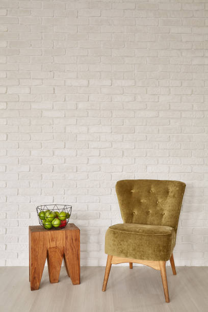 istock Room with armchair and stool 642242202