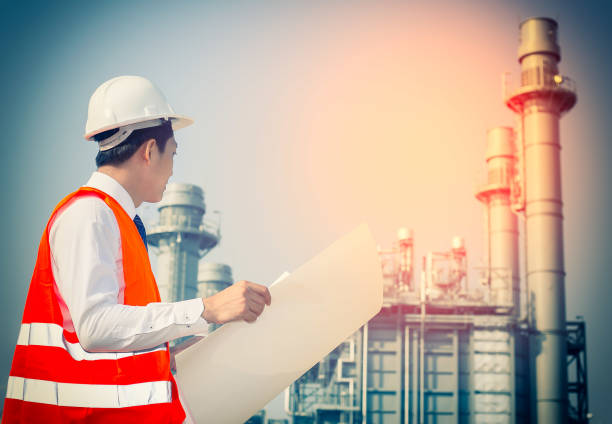 istock woman engineer and men engineer work new project in power plant 642242326