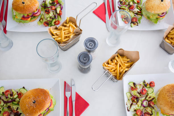 istock Delicious burgers at table 642242512