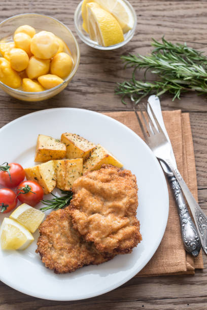 istock Portion of schnitzel with garnish 642262926