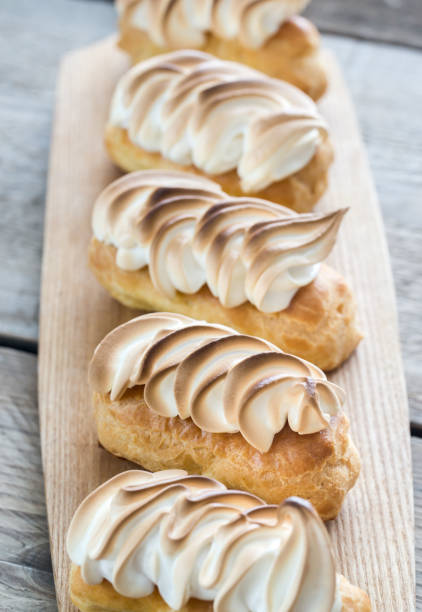 istock Eclairs with lemon curd and meringue 642263196
