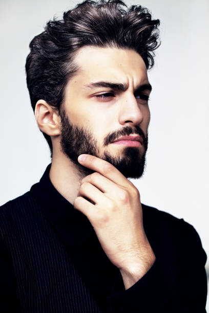 istock Bearded stylish man posing outdoors 642272658