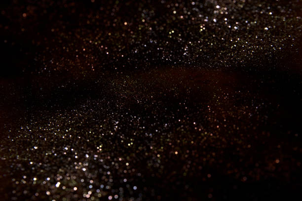 istock Abstract dark glitter lights texture or background.glitter wonderful lights background. 642275610