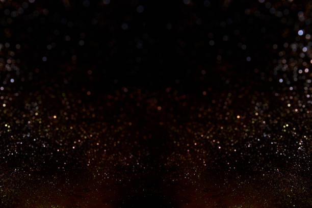 istock Abstract dark glitter lights texture or background.glitter wonderful lights background. 642275822