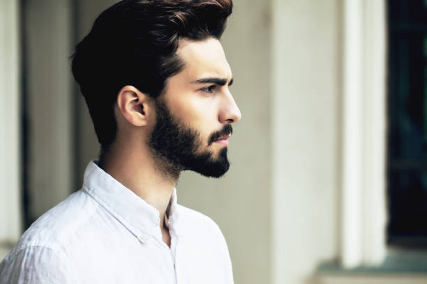 istock Bearded stylish man posing outdoors 642276104