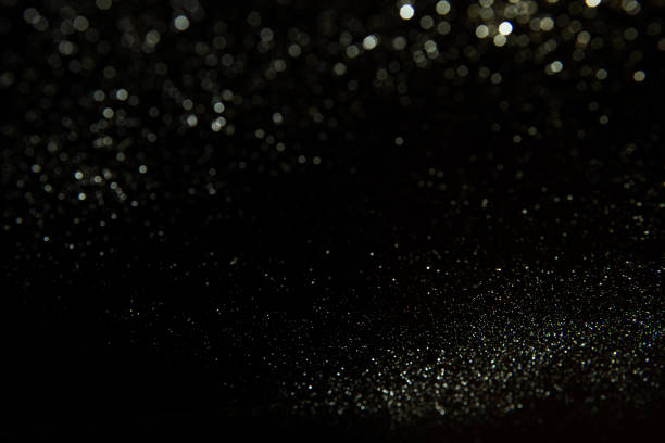 istock Abstract dark glitter lights texture or background.glitter wonderful lights background. 642279200