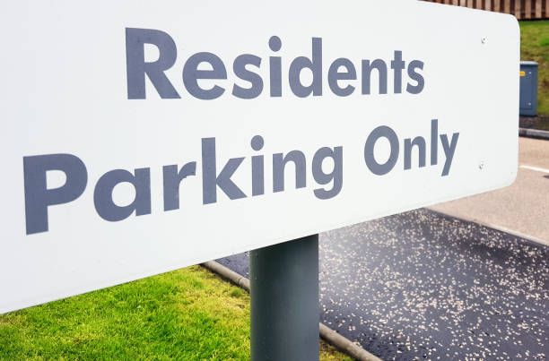 istock Residents Parking Only warning sign 642285600