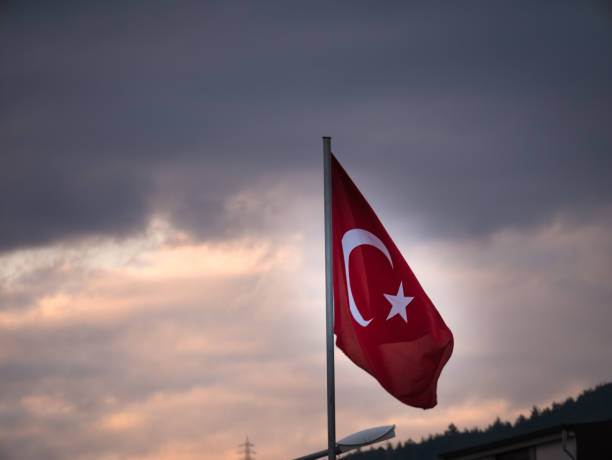 istock Flag of turey replublic with  sky background 642298910
