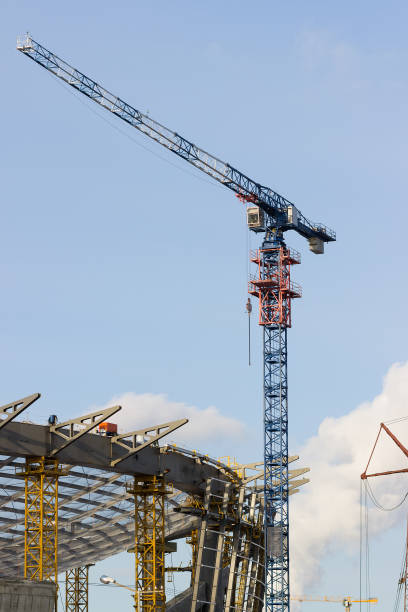 istock Tower cranes among dense urban areas in the construction of 642304636
