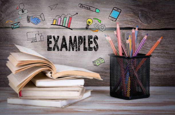 istock Examples, Business Concept. Stack of books and pencils on the wooden table. 642305258