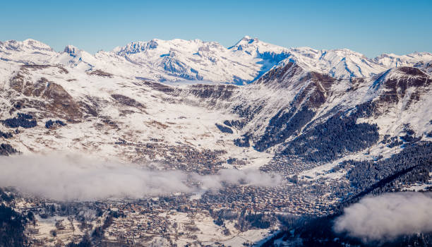 ski lift, slopes and mountains panorama of winter ski resort Chamonix, French Alps
