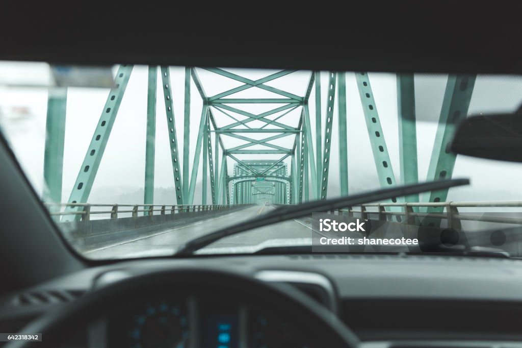 Driver's point of view on large bridge near Astoria, Oregon Driver's seat perspective inside vehicle driving on an extended bridge near Astoria, Oregon and Long Beach, Washington. Astoria - Oregon Stock Photo