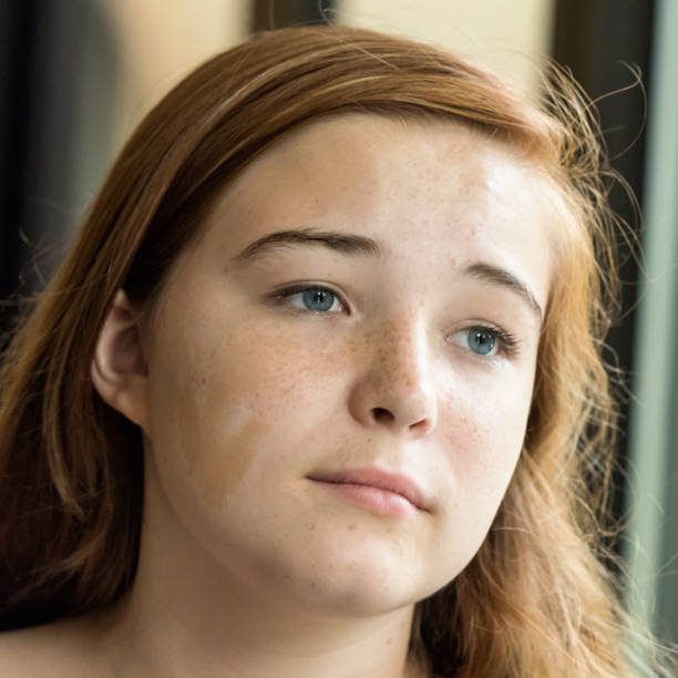 sad redhead teenage girl