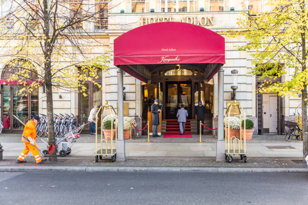 Hotel Adlon Kempinski with unidentified people. Its a luxury hotel on Unter den Linden, at the corner with Pariser Platz, directly opposite the Brandenburg Gate