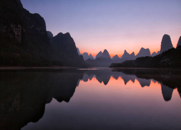 istock Li River Dawn reflections, Guilin, China 642375944