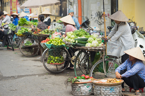 Hanoi, Vietnam - Oct 25, 2015: Vegetable market on street in Hanoi