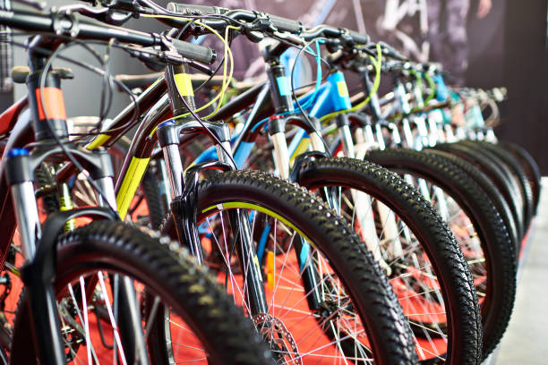 Modern mountain bikes in sports shop Row modern mountain bikes in sports shop velodrome stock pictures, royalty-free photos & images