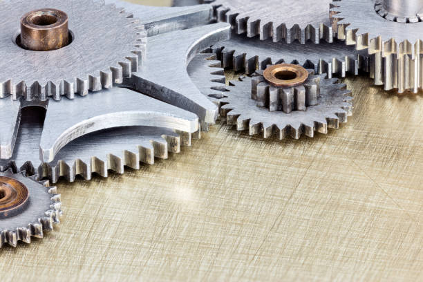 istock various gear cogwheels for industrial equipment on metal background macro 642424914