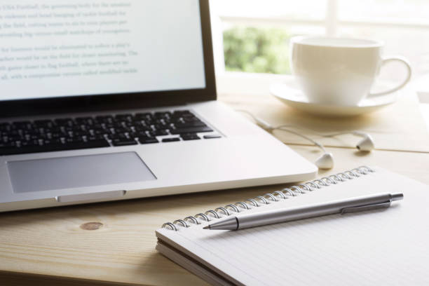 istock Pen and notebook with laptop.Inspiration moment 642427324