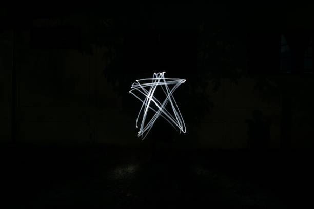 star  - lighting equipment illuminated isolated on black part of - fotografias e filmes do acervo