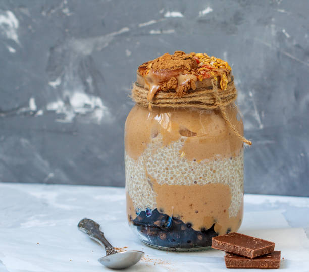 istock Chocolate smoothie with chia and berries in the jar 642434874