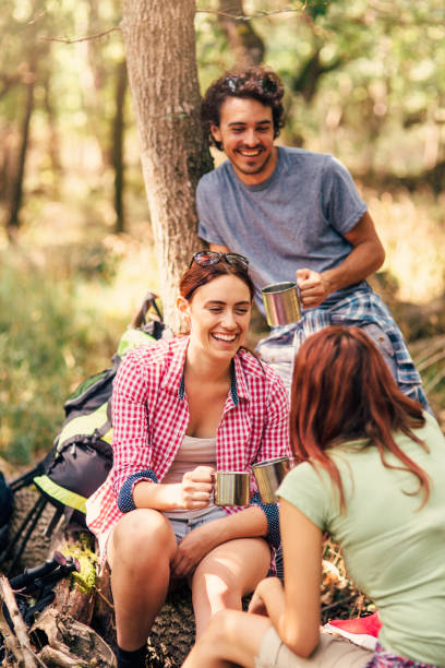 istock Hikers resting in the woods 642434878