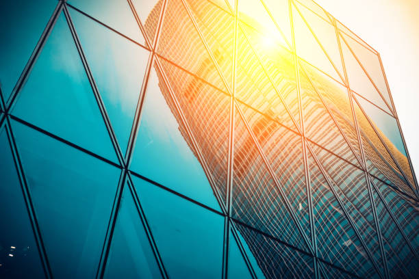istock Modern commercial building with sun ray reflection in window 642438744