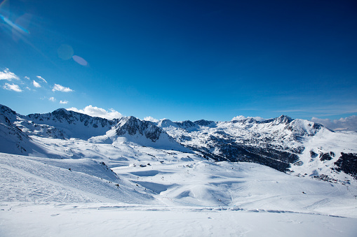 Snowy mountains at sunny day. Canillo ski region, Andorra