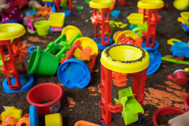 istock Kid colourful toys with man made 