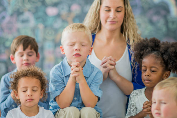 istock Praying in Sunday School 642458486