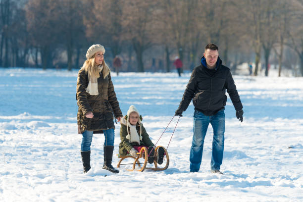 istock Family haveing fun on snow 642470722