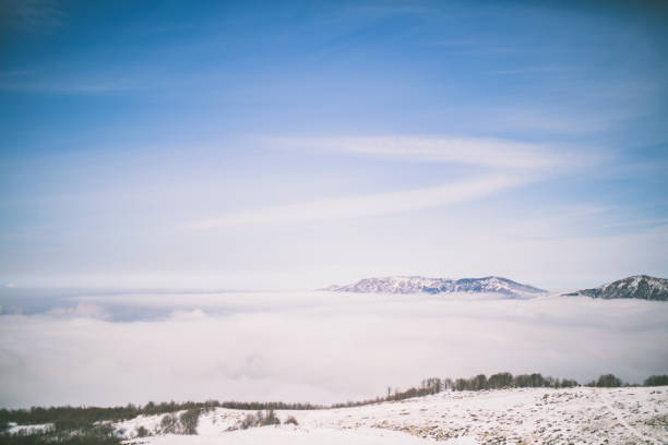 istock High mountains under snow in the winter 642476056