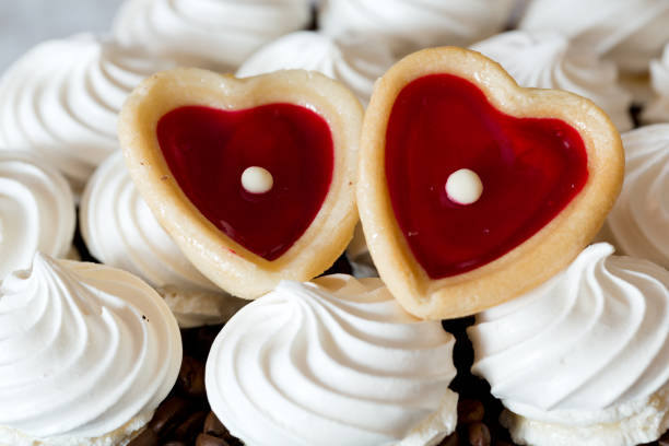 istock French vanilla meringue cookies and two sweet hearts 642476292