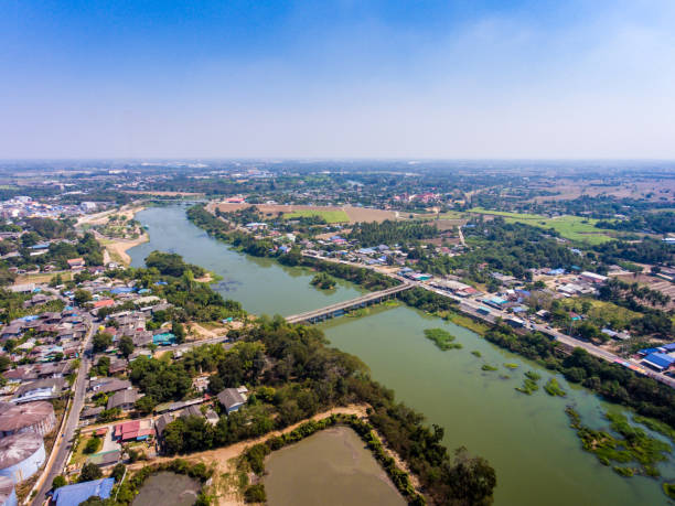 istock Rural area landscape with tranquil village and river 642476790