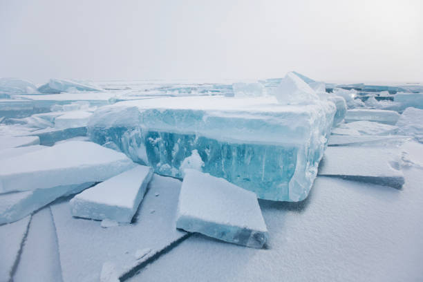istock Turquoise ice floe. Winter landscape. Baikal lake 642482894