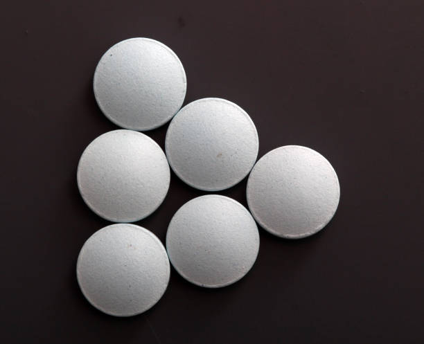 istock blue medical pills, health concept 642490412