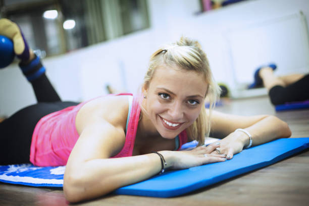 istock Beautiful pilates and fitness instructor 642493828