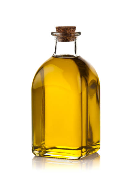 istock Olive oil bottle isolated on white background 642495110