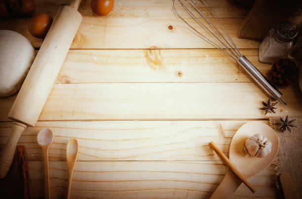 istock Blank wooden table background and bakery ingredients with copy space 642497834
