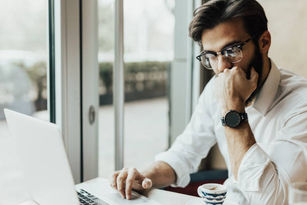 istock Worried man overloaded with work at office 642502172